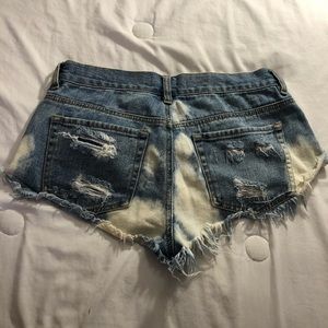 Bull head ripped denim shorts